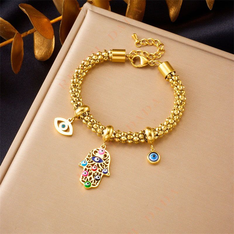 DaDa Fashion Europe America personality vintage, high-grade gold-plated stainless steel, dripping oil, Fatima hand, eye pendant jewelry bracelet