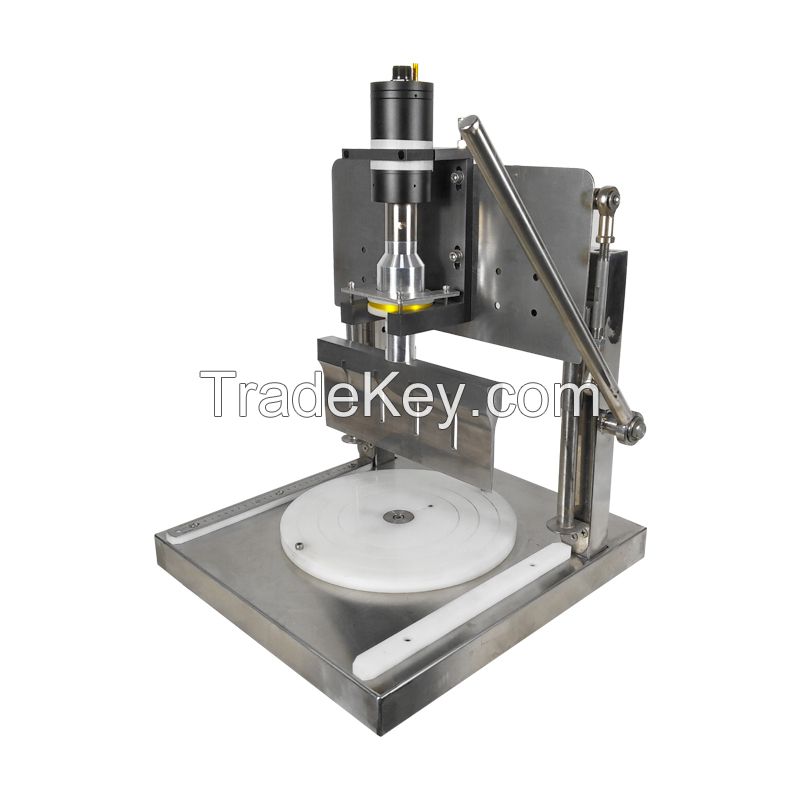 Ultrasonic hand pressure cutting machine. 