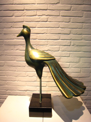 Hand craved golden bird by fiberglass