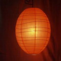 round paper lantern and holiday string lantern