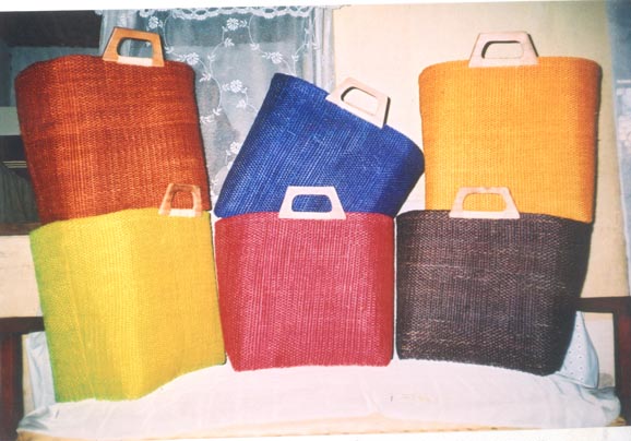 Raffia , sisal , cotton , and silk handbags and baskets