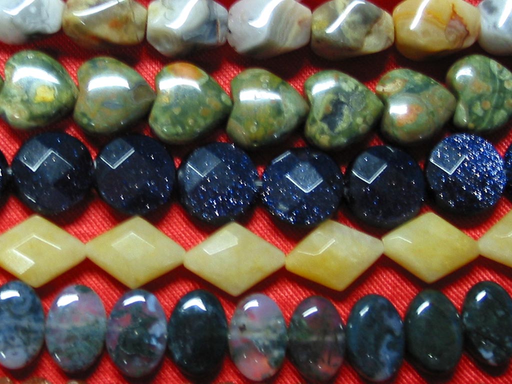 Crazy lace agate , Rhyolite, Blue sandstone, Yellow jade , Moss agate,