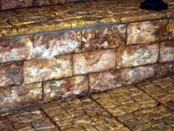 paving bricks, fences, fireplaces, stairs made of concrete