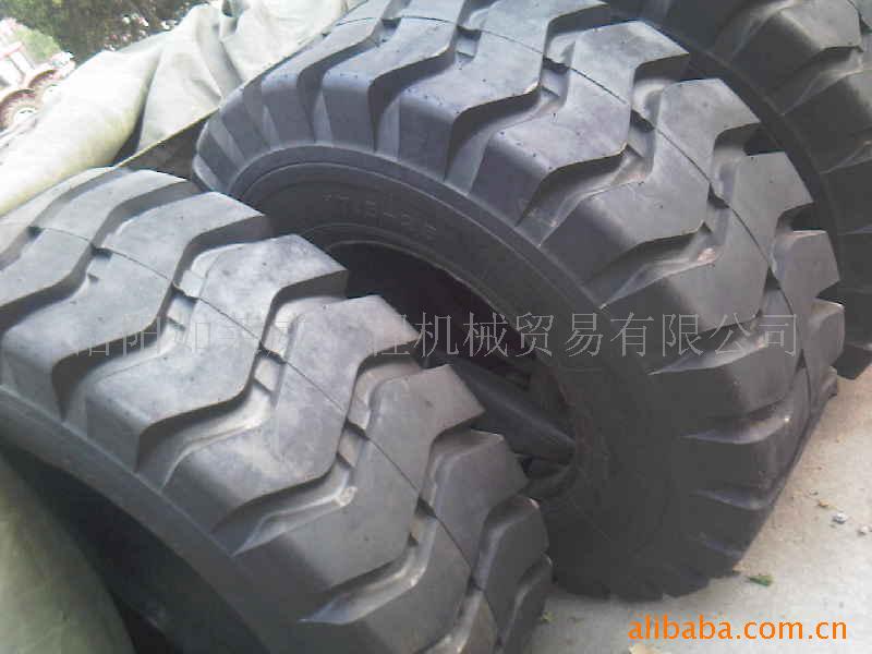 Grader tires, tire loader, roller tire