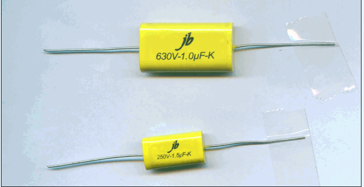 Axial polyester, polypropylene film capacitors