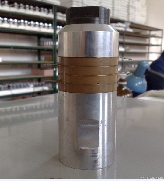 Ultrasonic energy transducer for welding, polishing and drilling