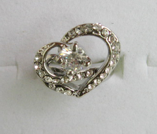 alloy ring , 2 part put together as one , with diamond beset