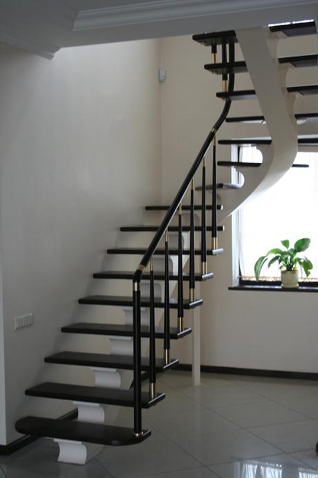 Iron stairs with wooden, metal and granite steps