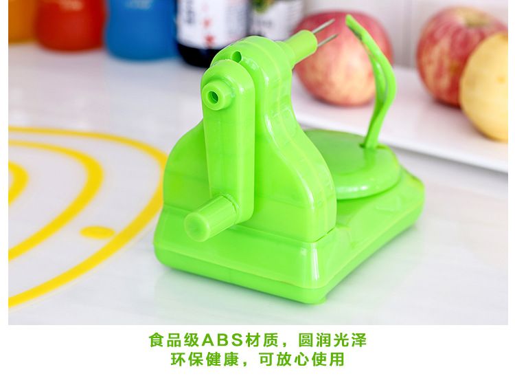 Hand crank fruit peeler