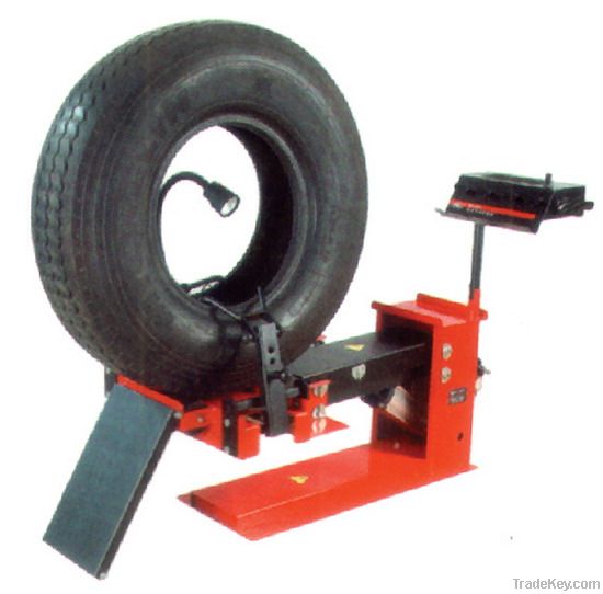 Truck tire spreader