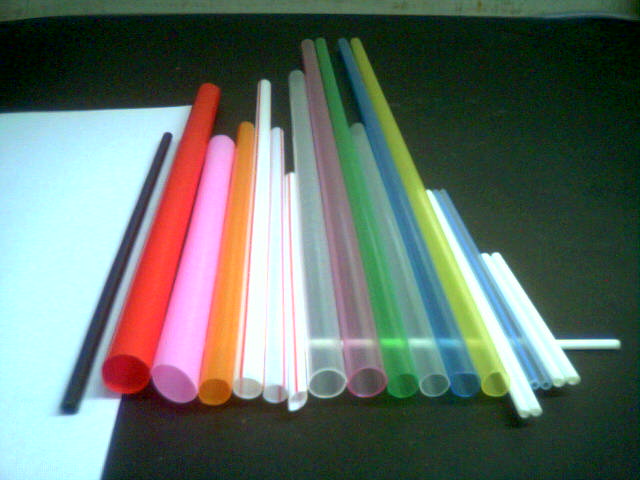 Plastic drinking straws, candy tubes and lollipop sticks