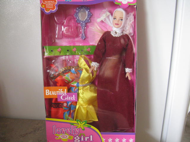 Jameelah muslim doll with hijab and abaya and 3 extra indoor outfits