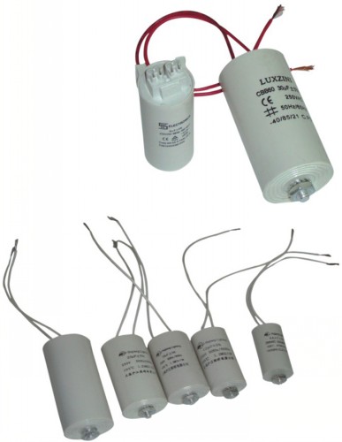 compensation capacitor for lighting fixtures