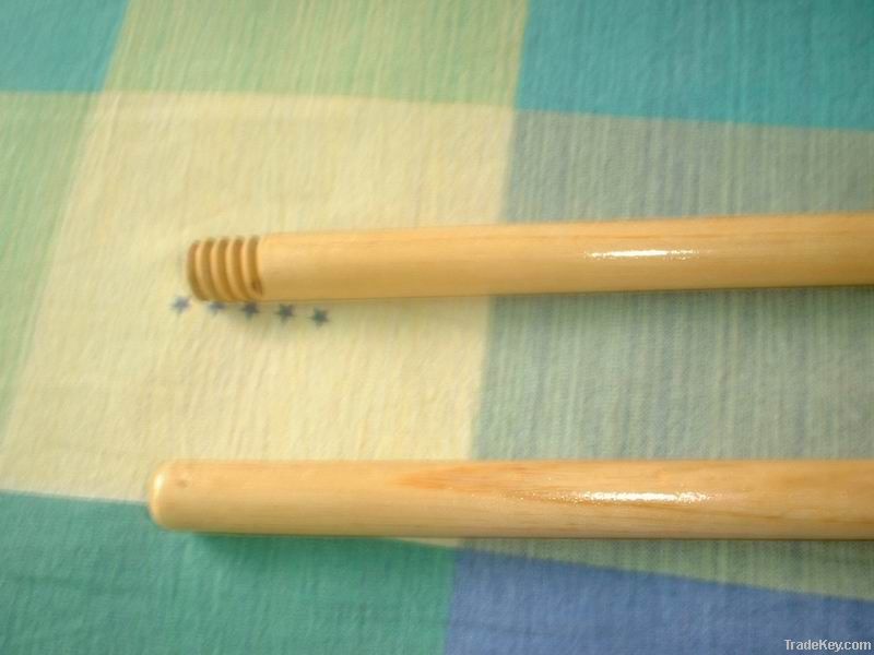 Varnished wooden broom handle