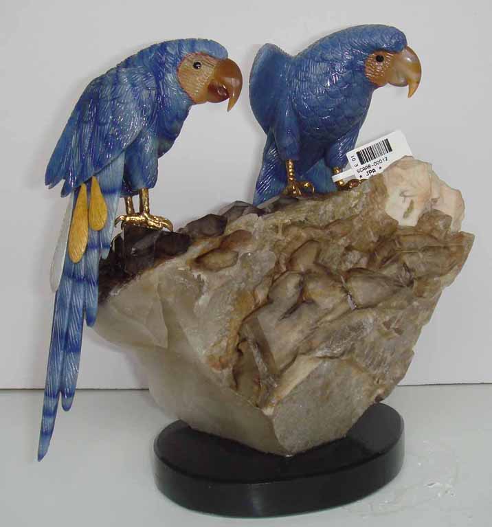 Hand carved Macaw couple