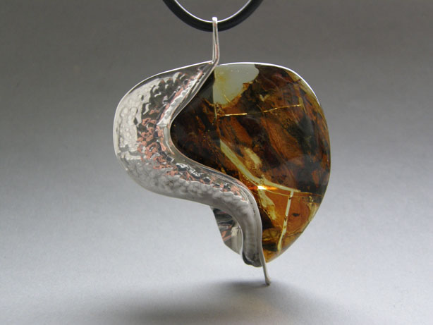 Amber pendant set in 925 st silver