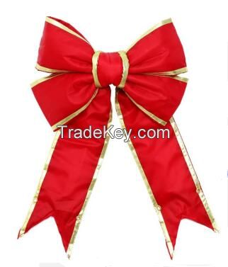 structual 3D red velvet Christmas bow with silver trim