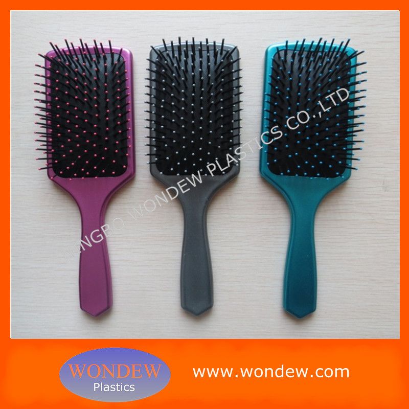 Plastic paddle brush for hair
