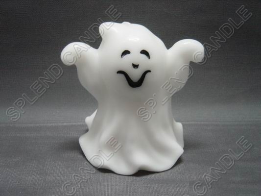 white ghost shape candle