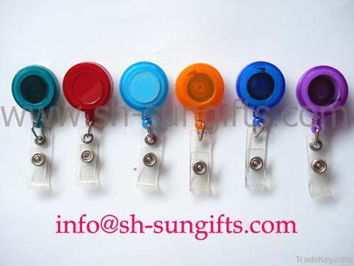 Retractable reel, badge holder, office stationery