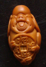 olive pit carving  cai