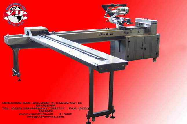 EARED TYPE SIDE FEED FLOWPACK WRAPPING MACHINE