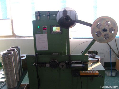 Vertical semi-automatic winding machine for SWG