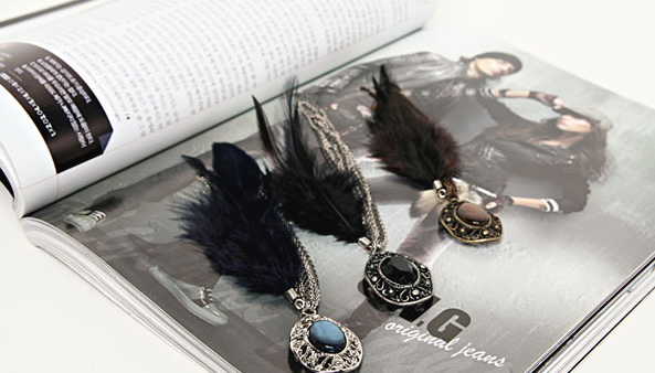 feather brooch