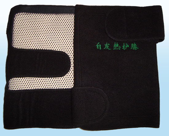 Self-heating knee pad
