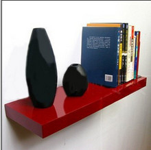 red floating shelf with bracket