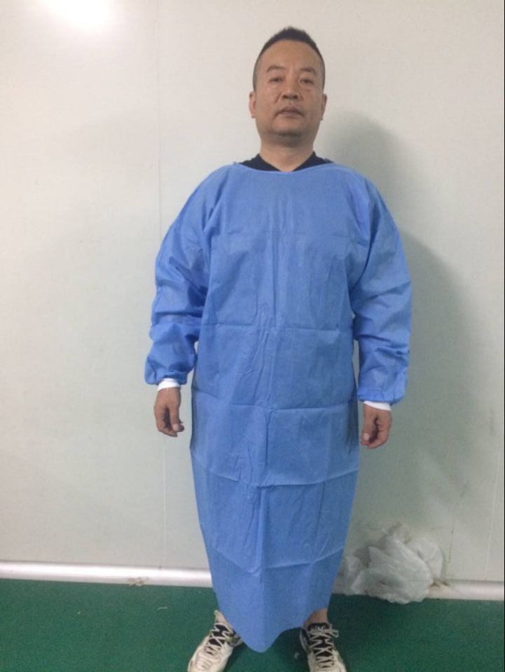 Surgical gown coverall