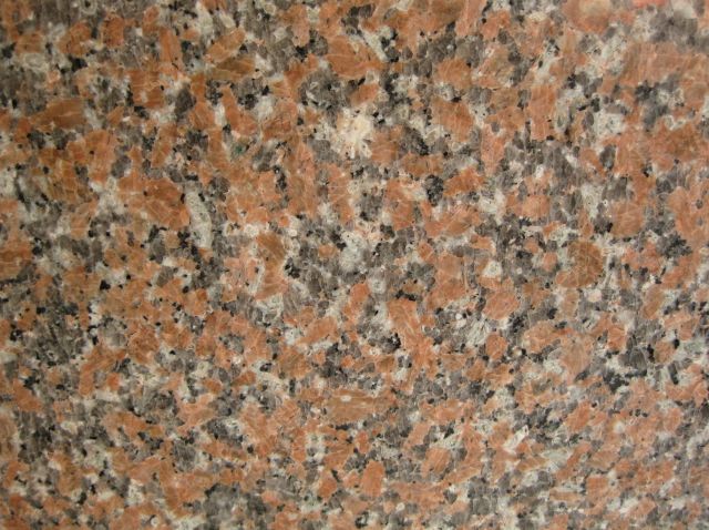 red granite tile-maple leaf red