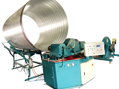 Spiral tubeformer machine