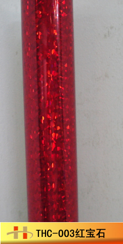 Red laser hot stamping foil with design for plastic