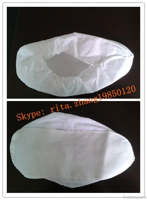 Nonwoven shoe cover with PVC sole