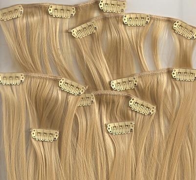 Clip-in human hair extension