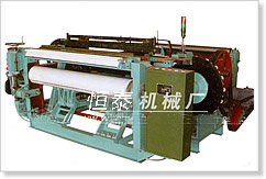 shuttless weaving machine