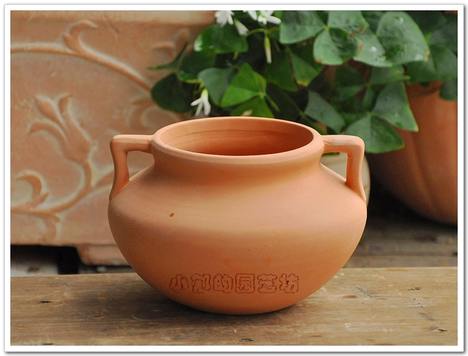 overstaffed pottery  pot (terracotta)