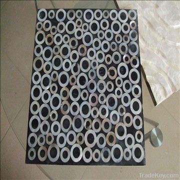 Round freshwater shell tile with resin coating