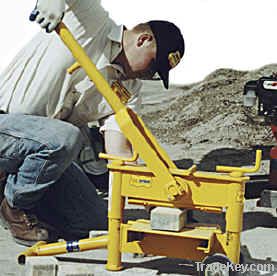 Hand-held clay or concrete brick splitter