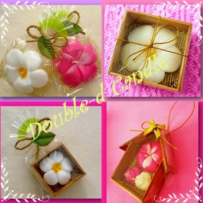 Big Plumeria candles in plastic box