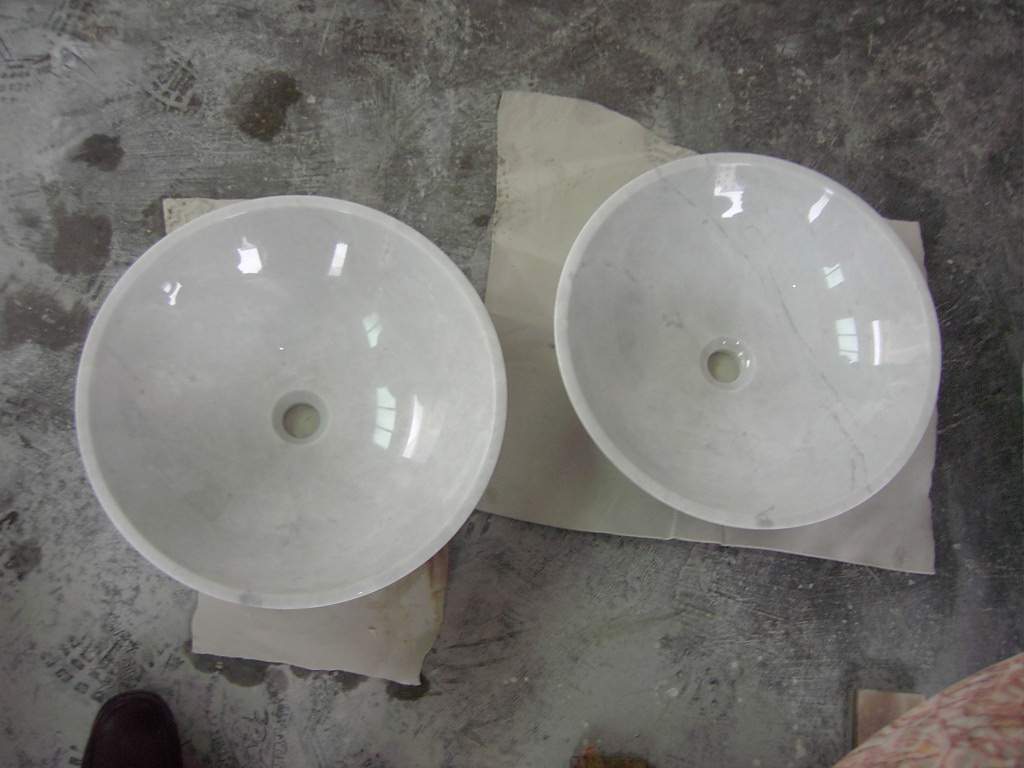 sinks made of marble and granite