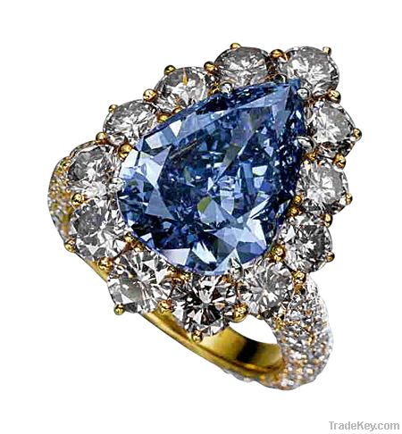 Pear blue diamond anniversary ring