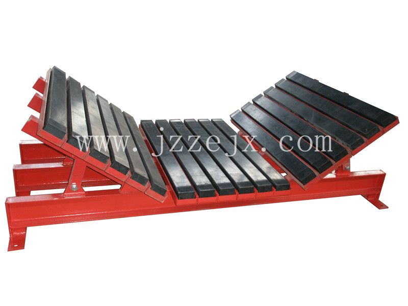 Impact bed for conveyor belt