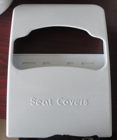 Dispenser for 1/2 toilet seat cover paper