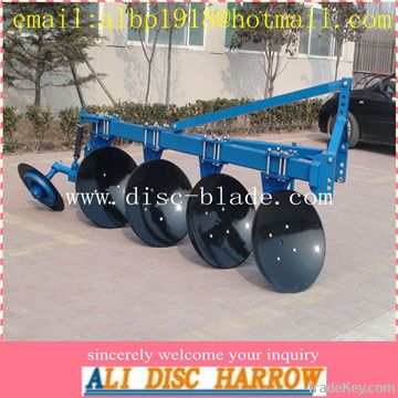 disc plough with tractor in agriculture