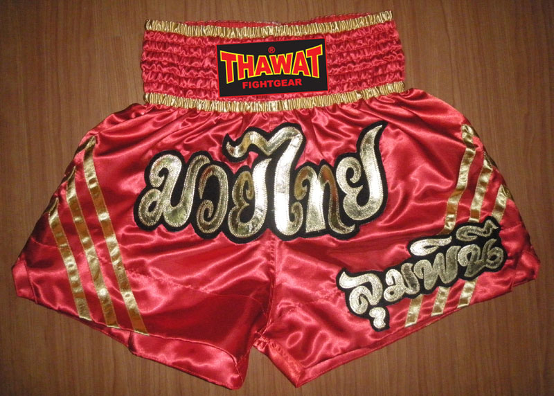 Muay Thai shorts red with tribals gold