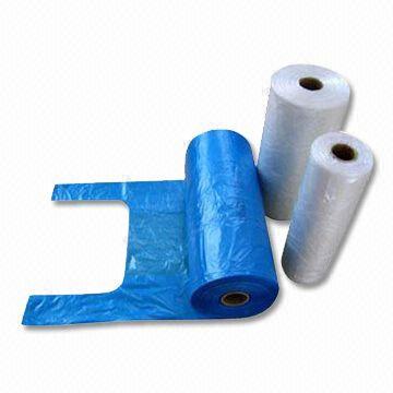 Plastic T-shirt bags on roll rope bags