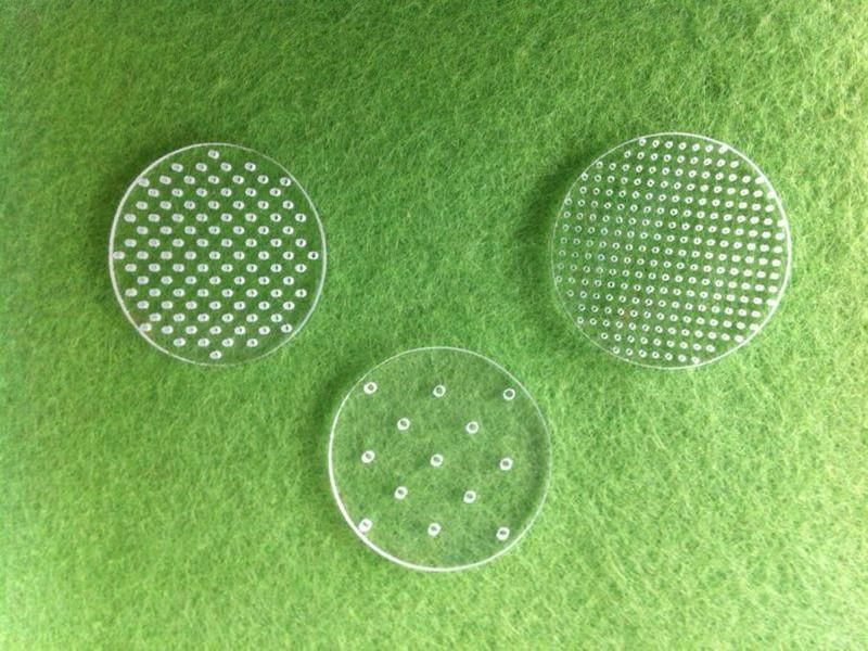 Laser perforated quartz glass plate