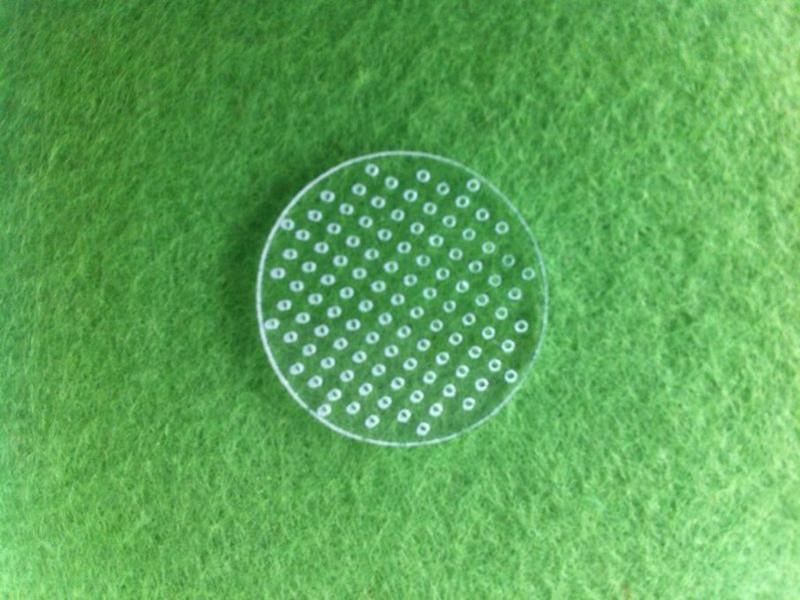 Laser perforated quartz glass plate